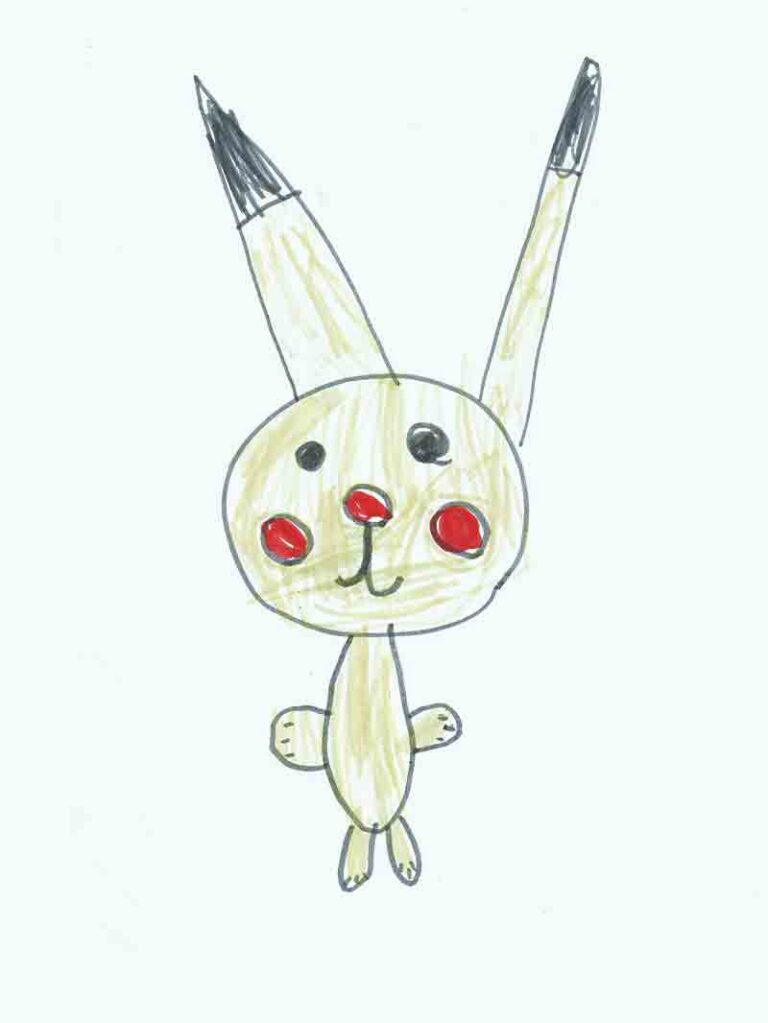 Der kleine Hase steht da.